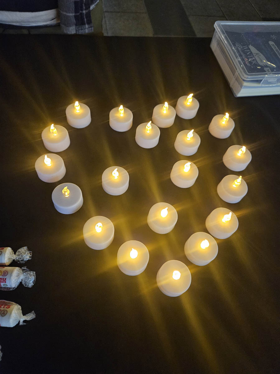 1000146045 candle light vigil